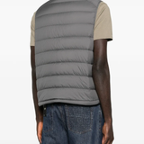 Grey vest worn by a person, showing the vest fit