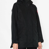 Black jackets worn by a person, showing the jackets fit