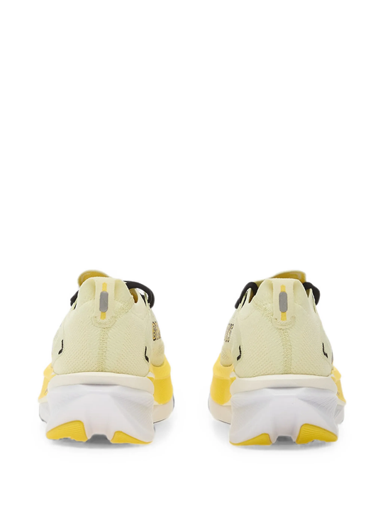 Yellow shoes, back view