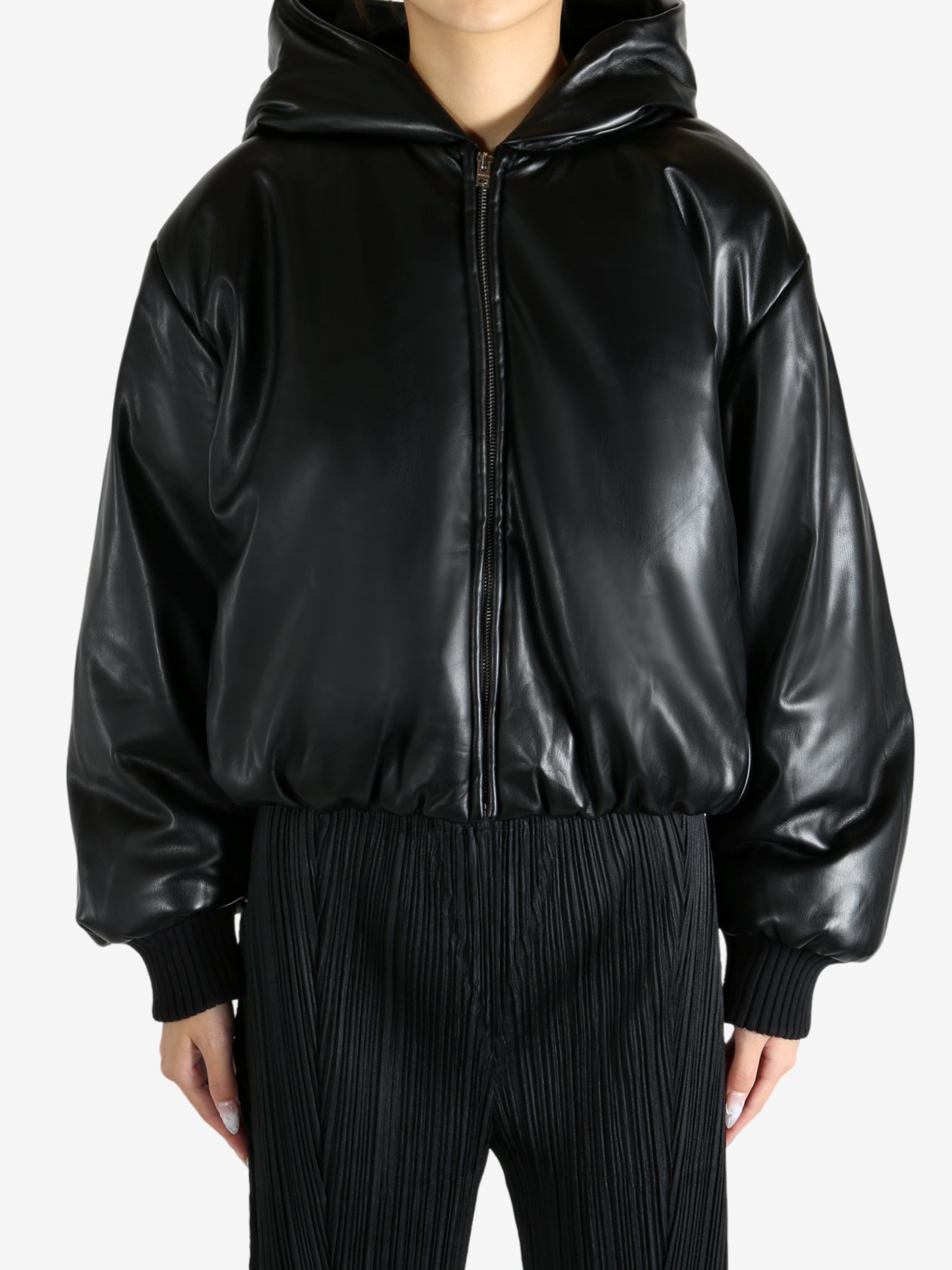 Black jacket worn by a person, showing the jacket's fit