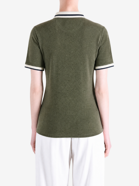 Green shirt worn by a person, showing the shirt fit