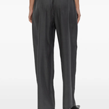 Black pant worn by a person, showing the pant fit