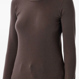 Close up of brown long sleeves, showing texture of the cotton fabric