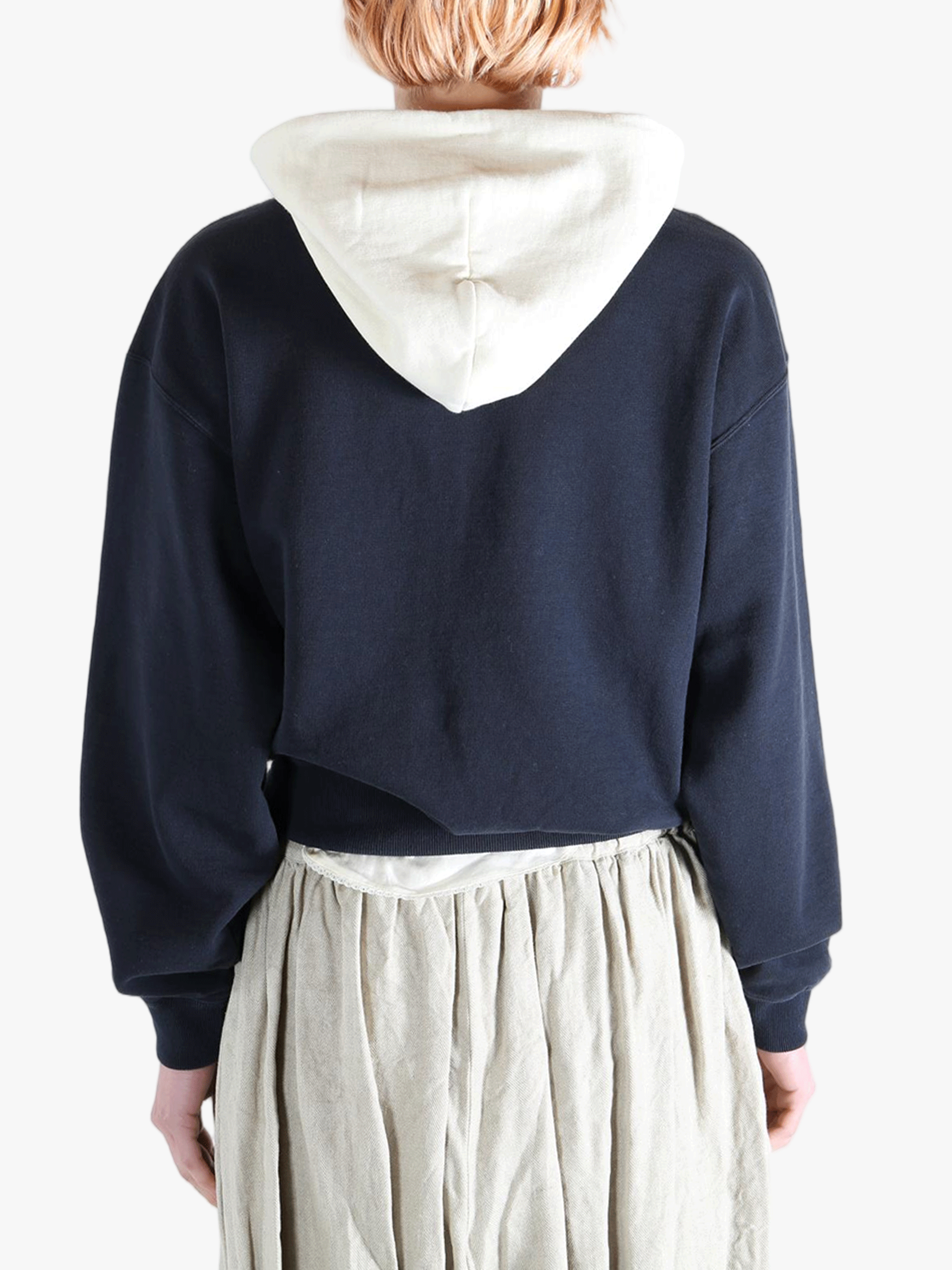 Navy parka worn by a person, showing the parka's fit