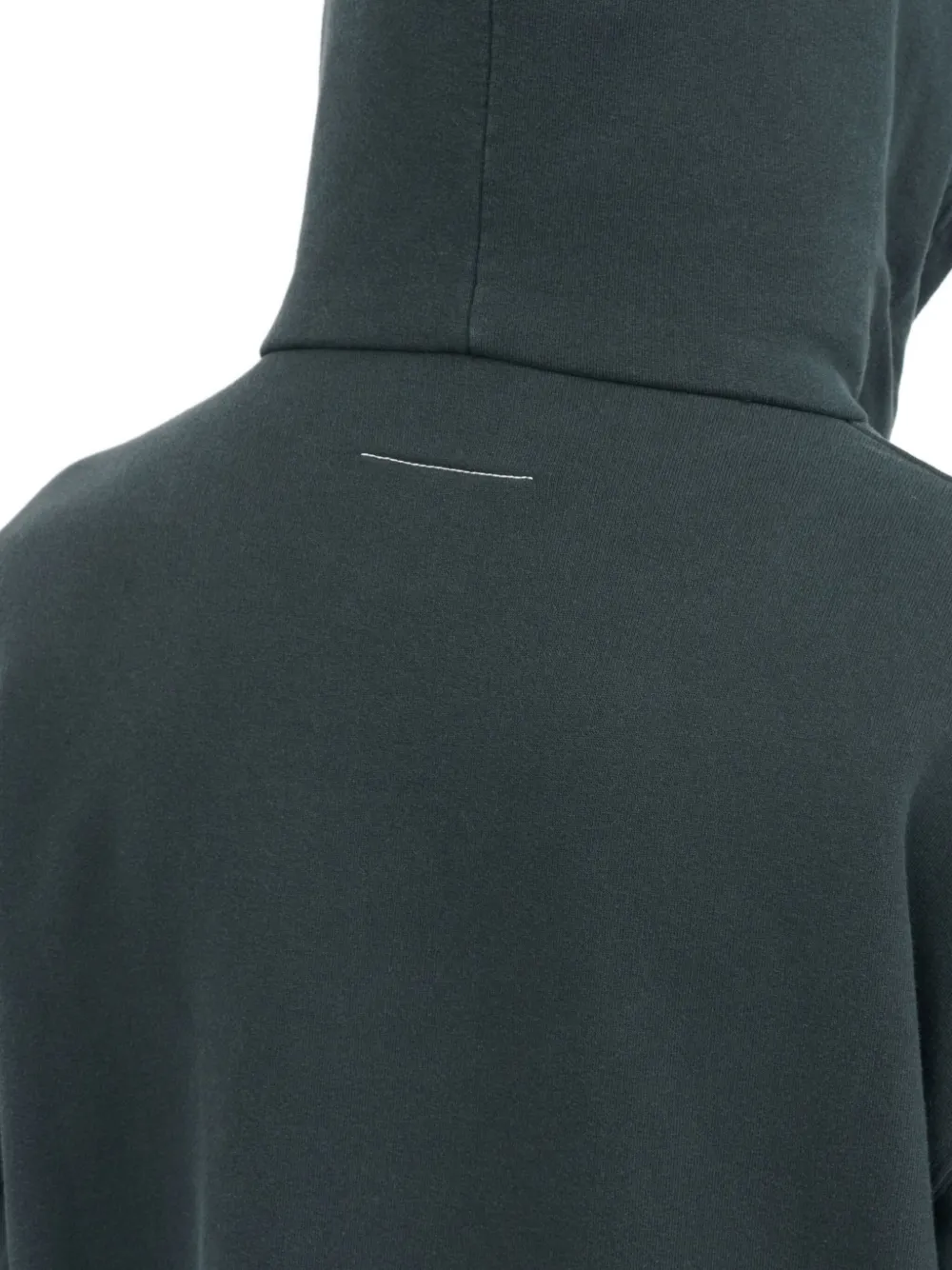 Close up of the black hoodie, showing texture of the cotton fabric