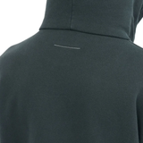 Close up of the black hoodie, showing texture of the cotton fabric