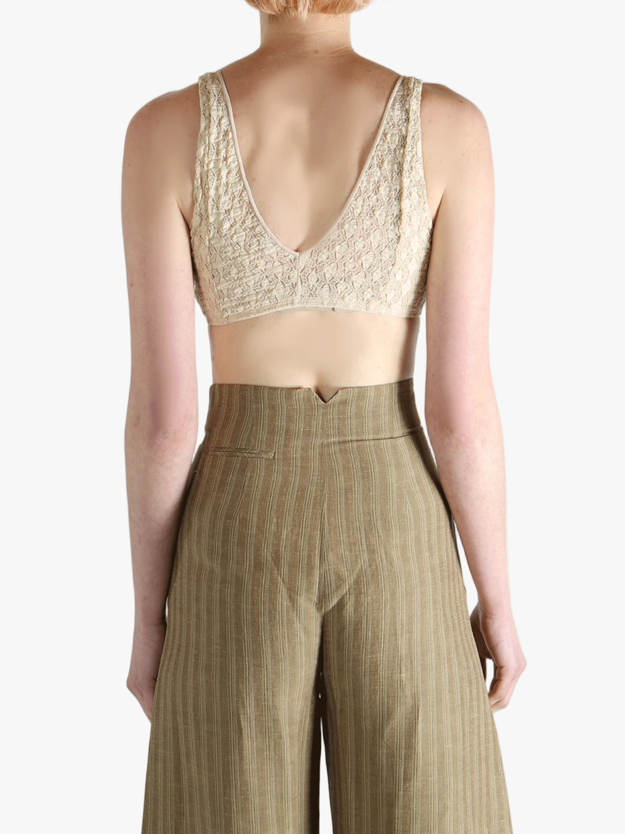 Tan bra worn by a person, showing the bra's fit