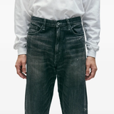 Blue pants worn by a person, showing the pants fit