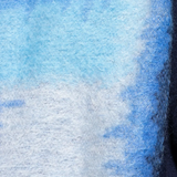 Close up of the blue sweater, showing texture of the wool fabric