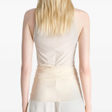 Tan top worn by a person, showing the top fit