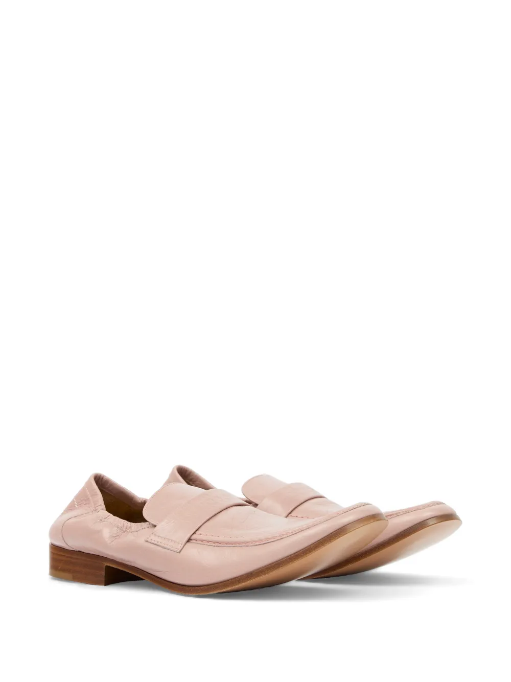 Pink loafers, side view