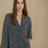 Navy dress worn by a person, showing the dress fit