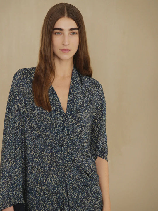 Navy dress worn by a person, showing the dress fit