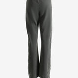 Grey pants worn by a person, showing the pants' fit