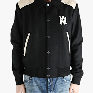 Black jacket worn by a person, showing the jacket's fit