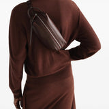 Brown bag worn by a person, showing the bag fit