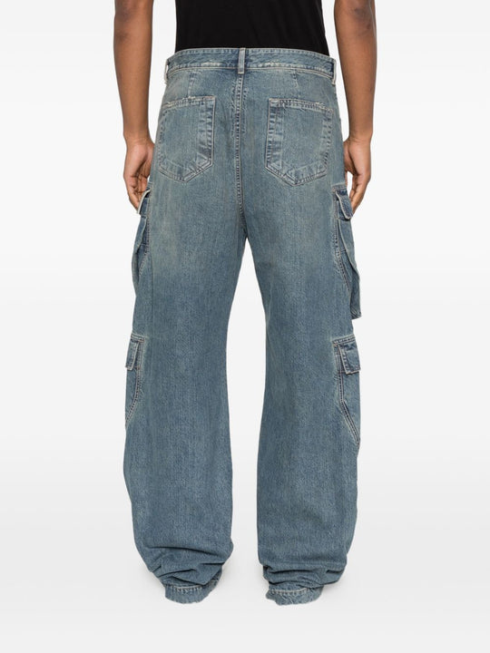 Blue jeans worn by a person, showing the jeans fit