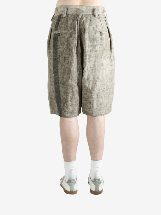 Grey shorts,worn by a person, showing the short's fit
