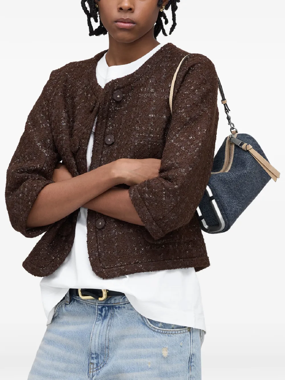 blue bags worn by a person, showing the bags fit