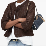 blue bags worn by a person, showing the bags fit