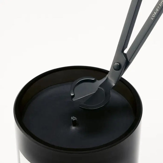 Close up of candle, showing texture of the limonene ingredients