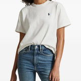 White t-shirt worn by a person, showing the t-shirt fit
