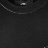 Close up of Black t-shirt, showing texture of the 100% cotton fabric