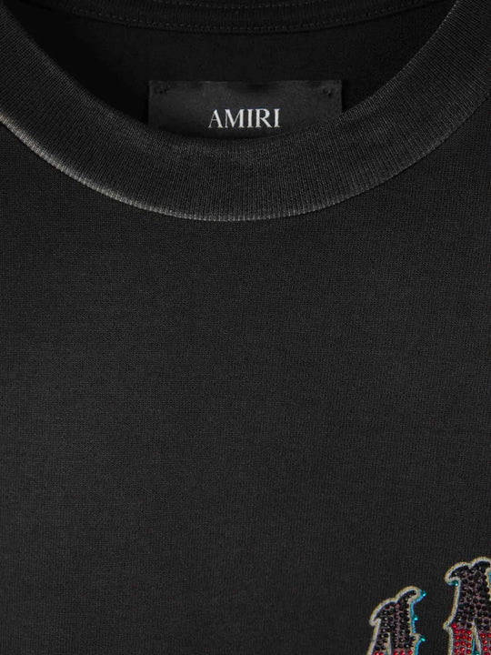 Close up of Black t-shirt, showing texture of the 100% cotton fabric