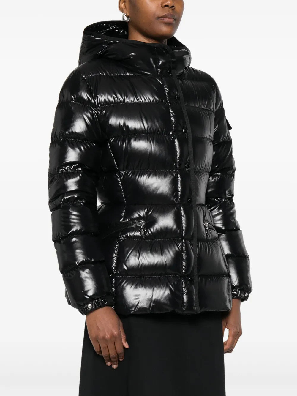 Black jacket worn by a person, showing the jacket fit