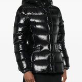 Black jacket worn by a person, showing the jacket fit