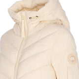 Close up of the tan jacket, showing texture of the nylon fabric