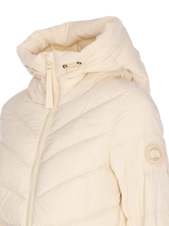 Close up of the tan jacket, showing texture of the nylon fabric