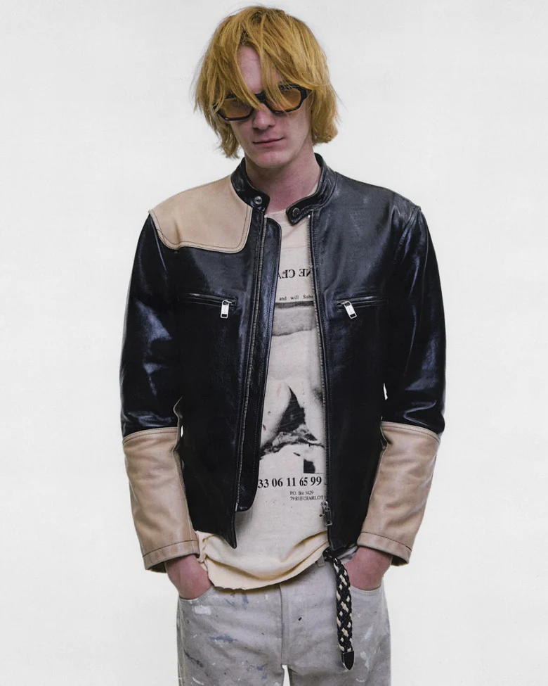 Black jacket worn by a person, showing the jacket fit