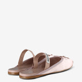 Pink mules, back view