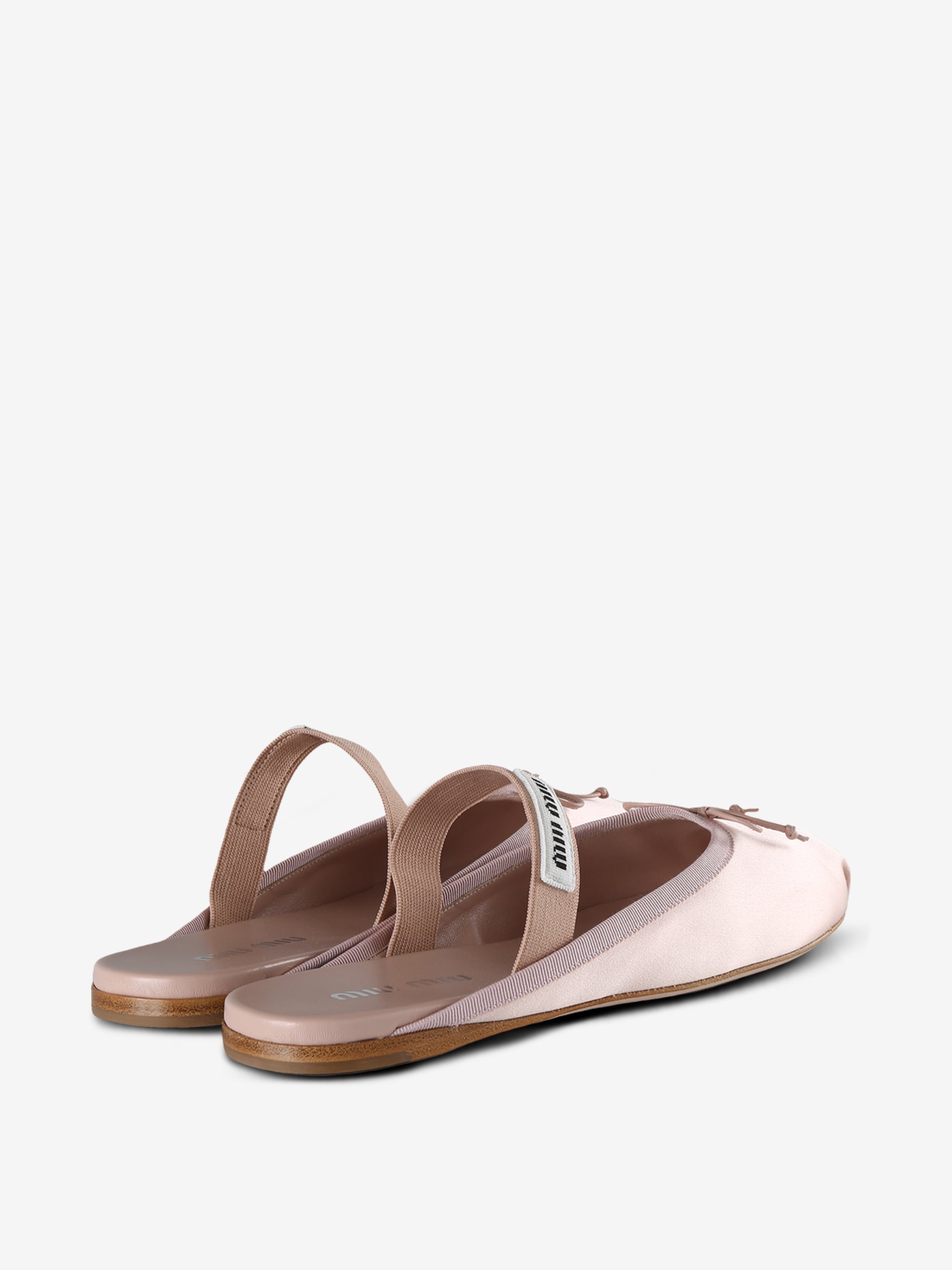 Pink mules, back view