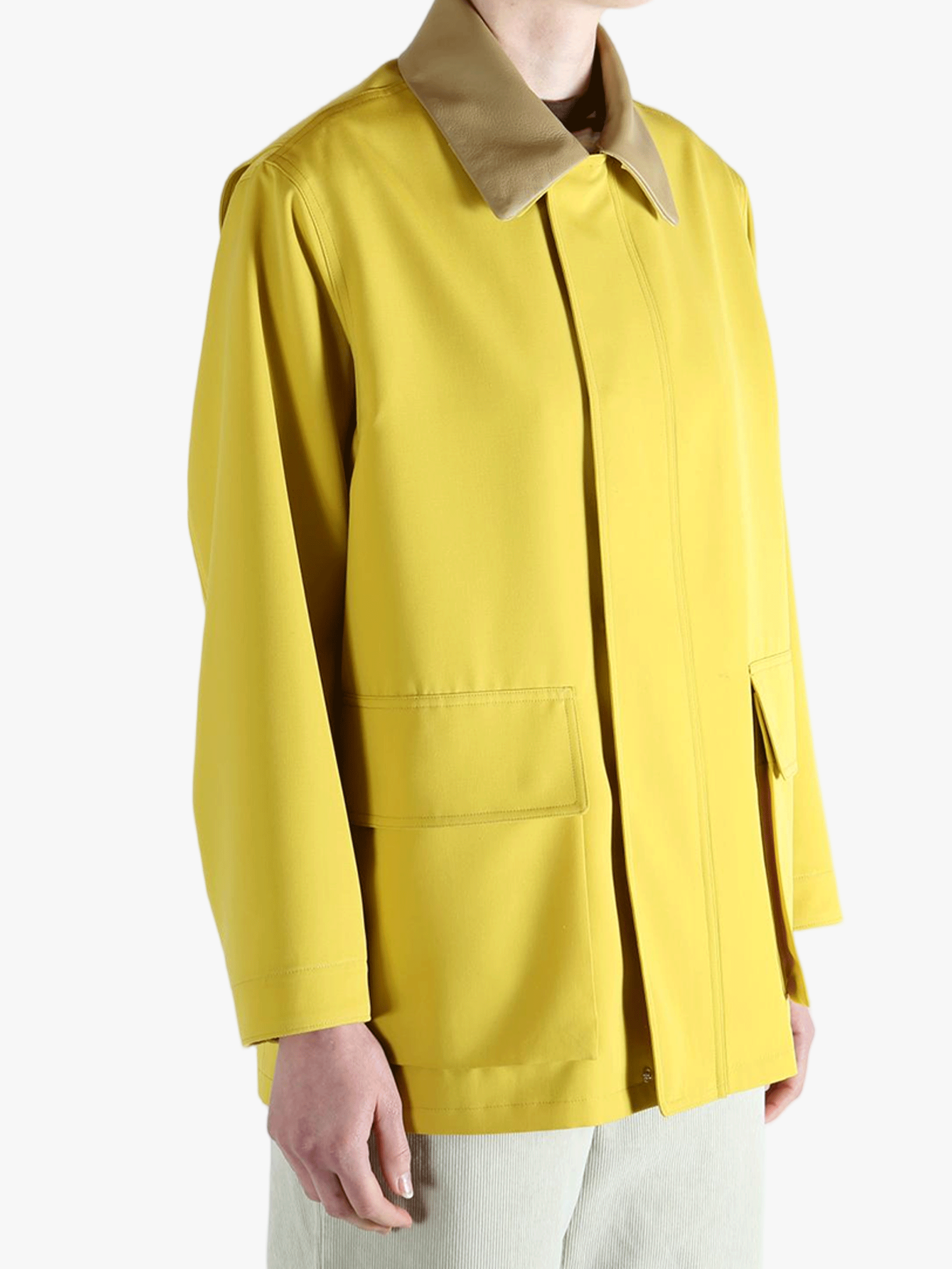 Yellow jacket worn by a person, showing the jacket's fit
