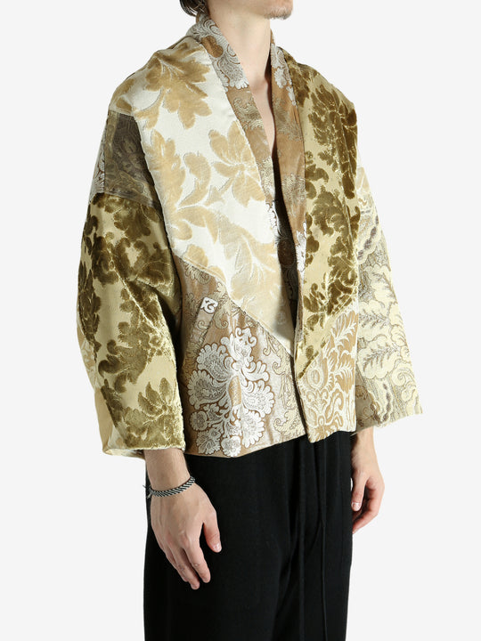 Tan jacket worn by a person, showing the jacket fit