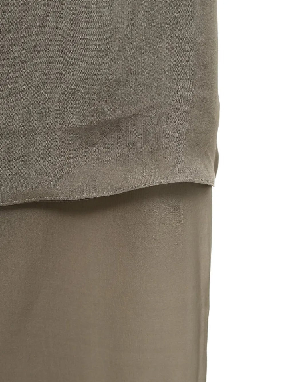 Close up of brown skirt, showing texture of the silk fabric