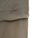 Close up of brown skirt, showing texture of the silk fabric