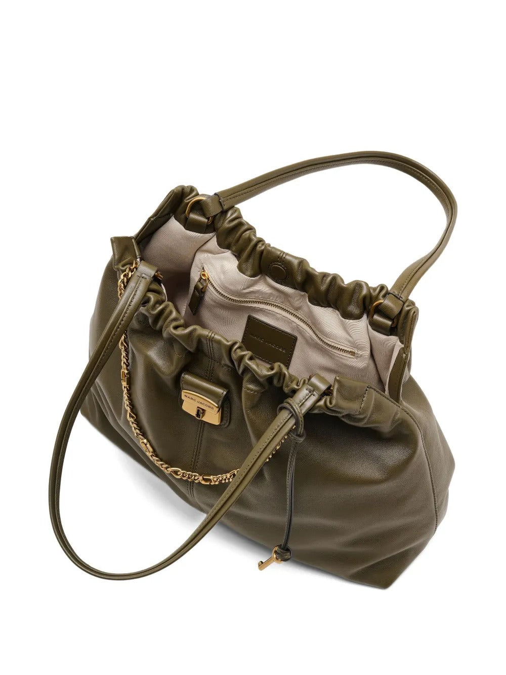 Close up of the green bag, showing texture of the leather fabric