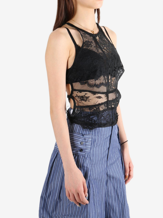 Black top worn by a person, showing the top's fit