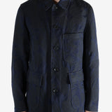 Navy jacket worn by a person, showing the jacket's fit