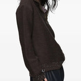 Brown tops worn by a person, showing the tops fit