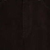 Close up of the brown pants, showing texture of the cotton fabric