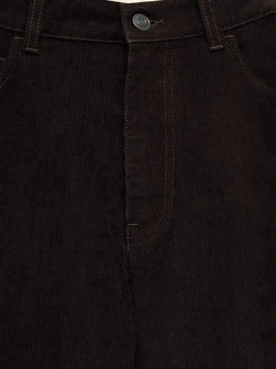 Close up of the brown pants, showing texture of the cotton fabric