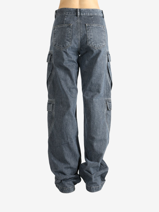 Grey pants worn by a person, showing the pants fit