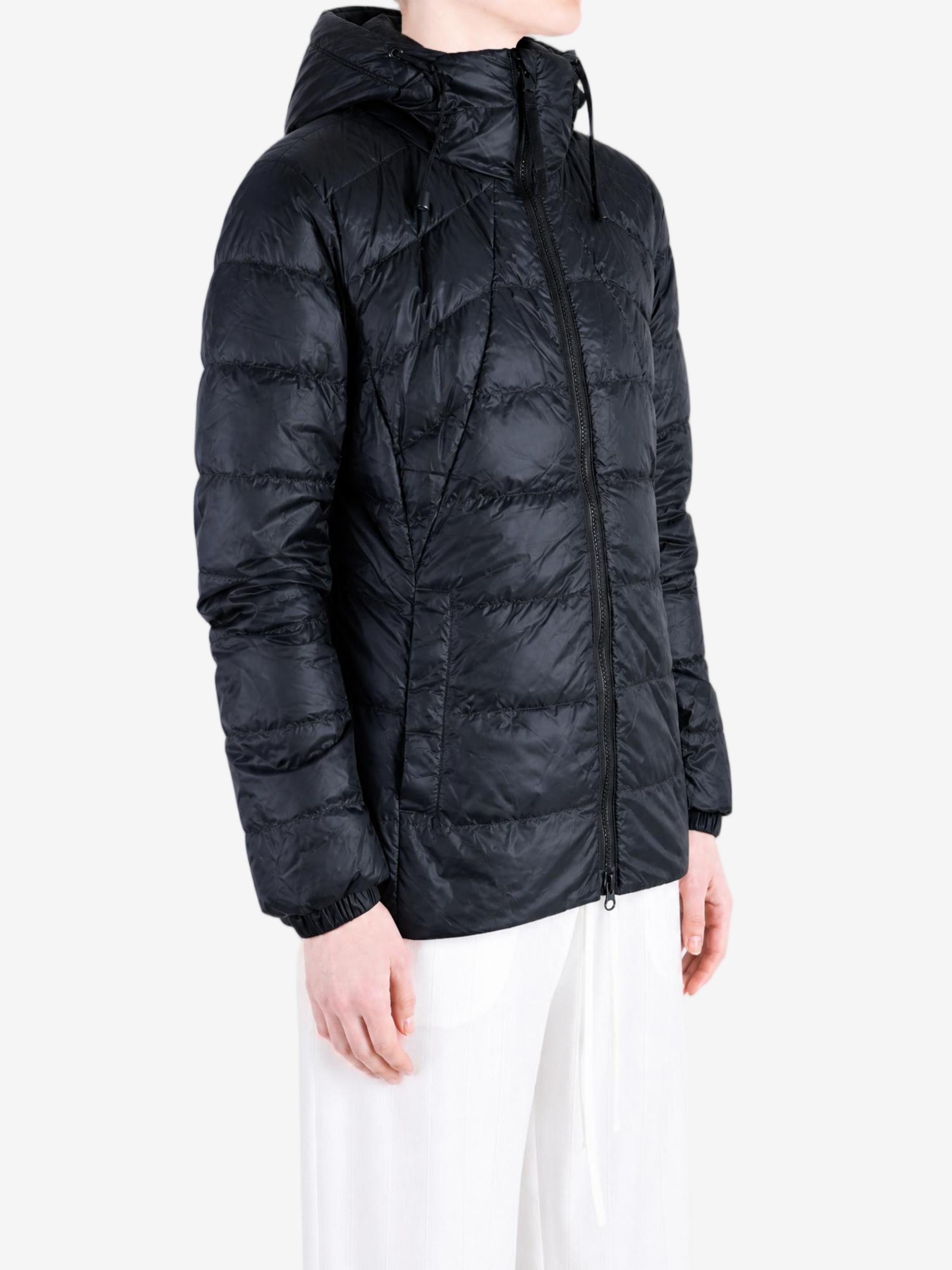 Black hoodie worn by a person, showing the hoodie fit