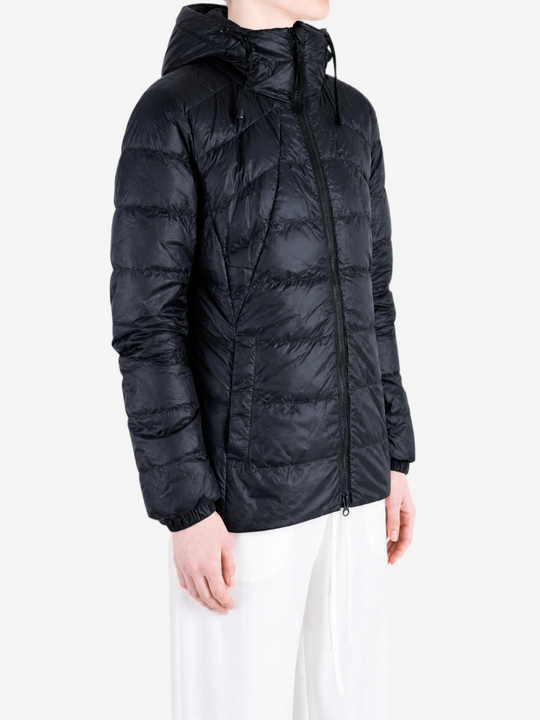 Black hoodie worn by a person, showing the hoodie fit