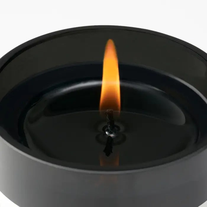 Close up of candle, showing texture of the limonene ingredients