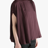 Burgundy top worn by a person, showing the top's fit
